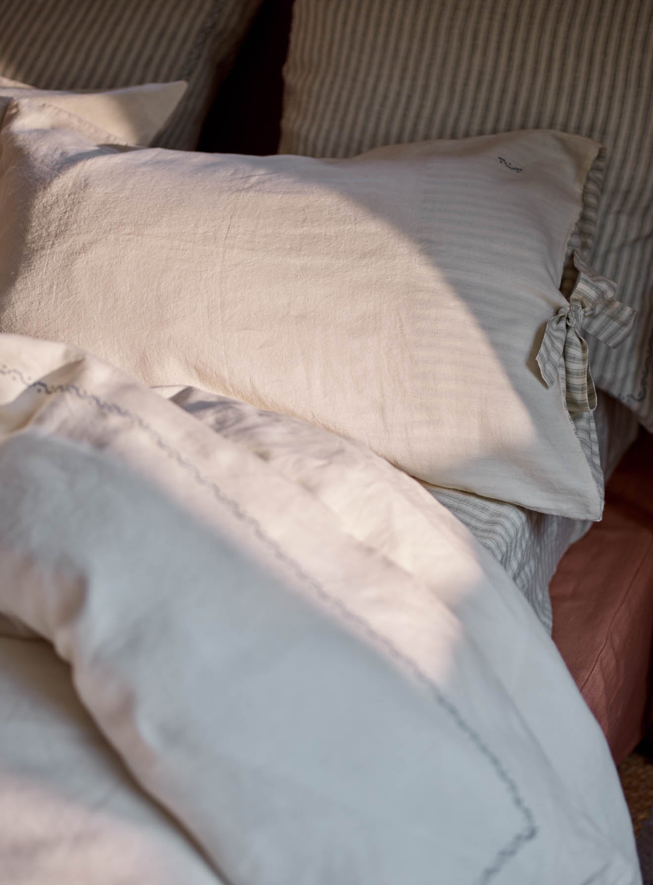 Embroidered linen pillow cases store