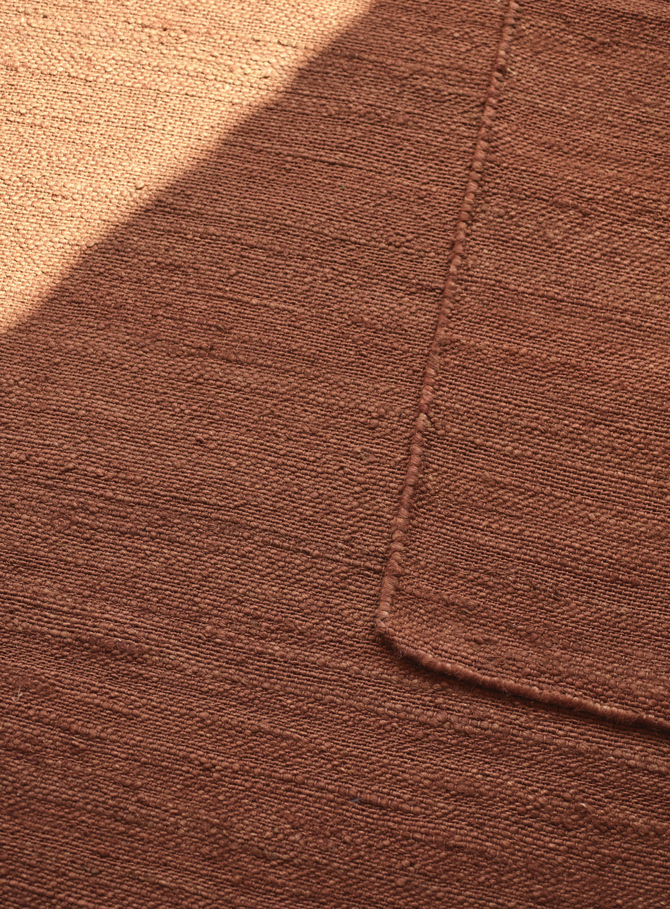 Rust Brown Jute Rug.